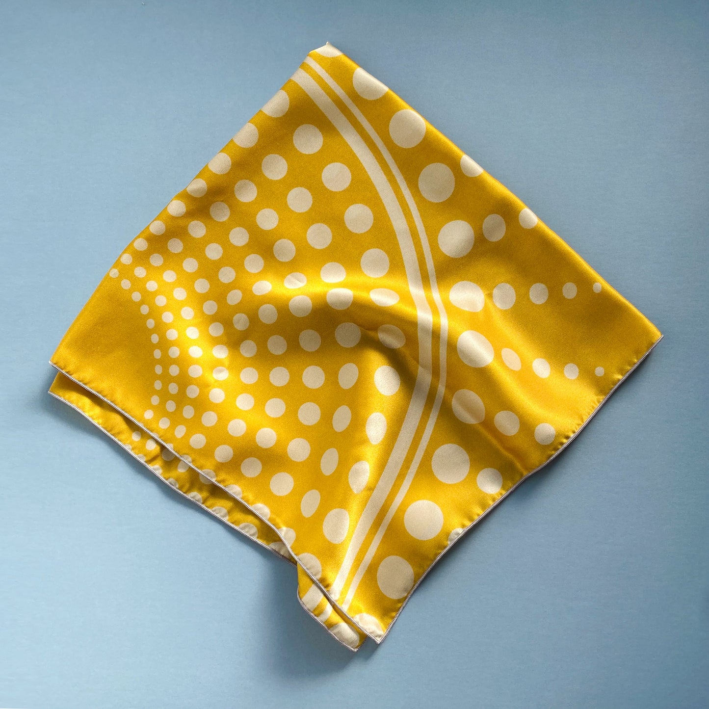 Sunshine is important. Luxury scarves are important. Bring them both together with a gold sunshine 100% silk scarf