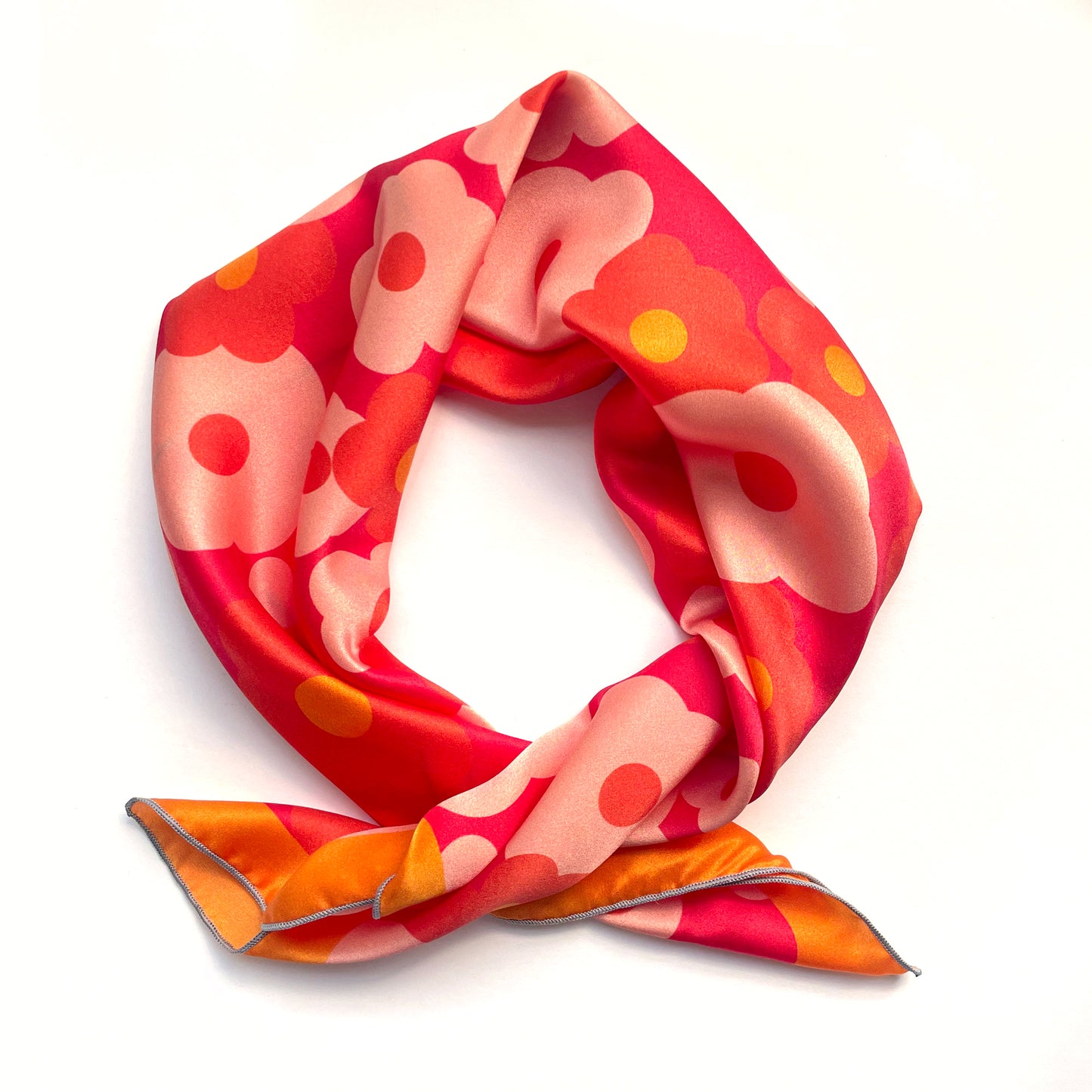 Cheerful pink, red, and orange flowers will brighten your mood and your look - wear as a neck scarf, hair scarf or accessorize as you like with this retro floral print