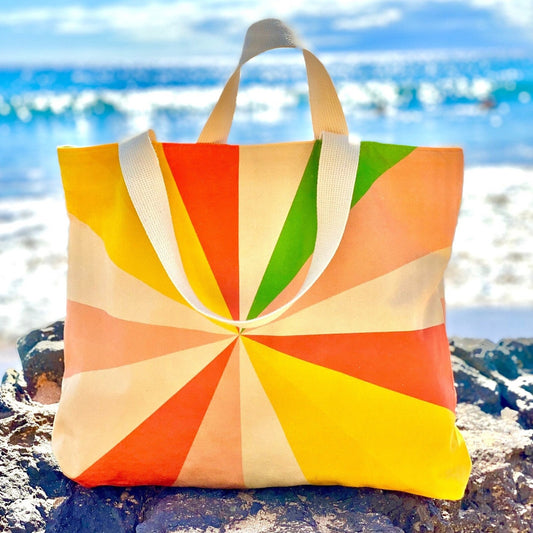 Geometric sunburst design on this colorful, oversized canvas bag, great for beach, market and travel.