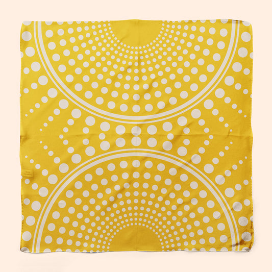 Let some sunshine into your day with this dotty 100% silk square scarf.