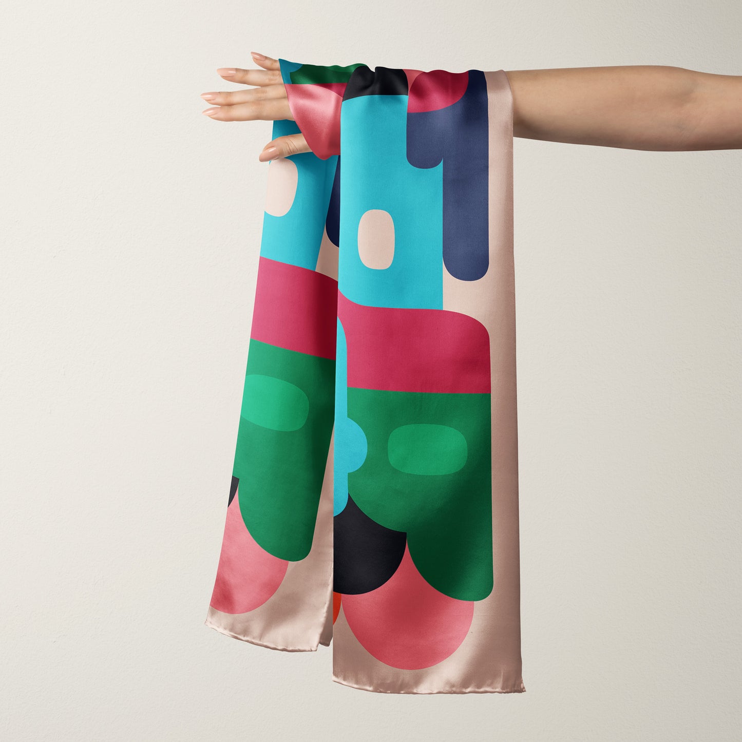 Designer retro silk scarf. Inspired by Art Deco with bold colors and shapes in greens, blues and pinks, this is a definite statement scarf. Wear it as a bandana or luxury head scarf