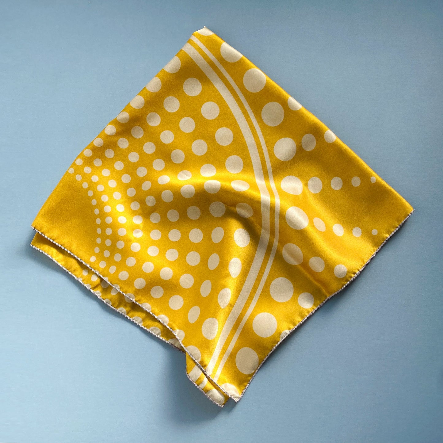 Sunshine is important. Luxury scarves are important. Bring them both together with a gold sunshine 100% silk scarf